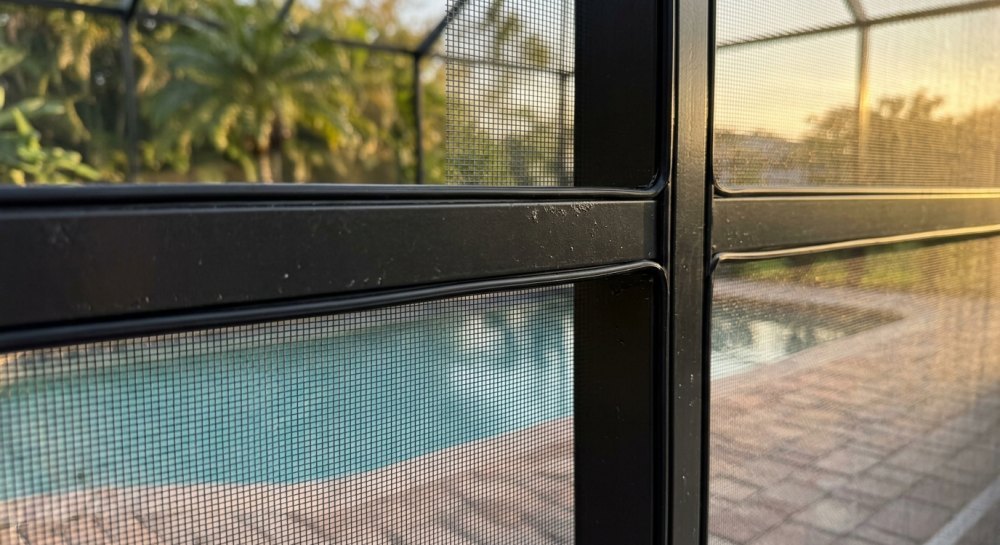 Lanai screen replacement, new 18x14 mesh installed tight in the frame