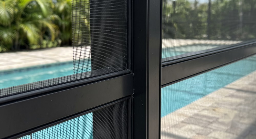 Tight new pool cage screen on a straight, solid aluminum frame after a rescreen in Sarasota, FL